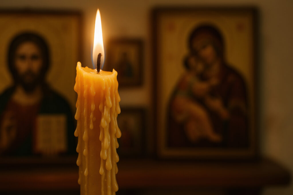 Candle burning in front of orthodox religious icons, symbolizing faith, spirituality, and sacred rituals in traditional worship Candle burning in front of orthodox religious icons, symbolizing faith, spirituality, and sacred rituals in traditional worship